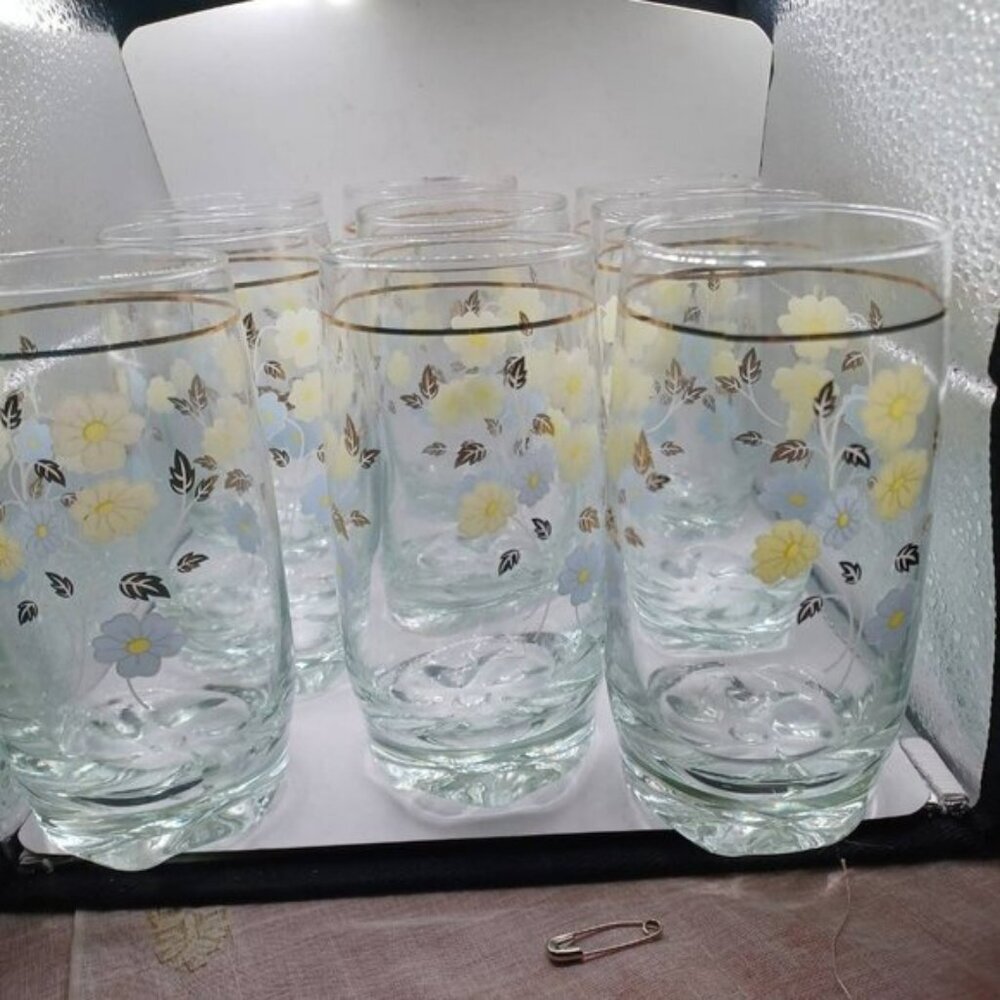 Set of nine floral gold vintage glasses heavy bottoms
